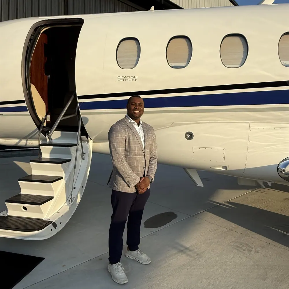 Cam Parker beside a Cessna Citation Latitude